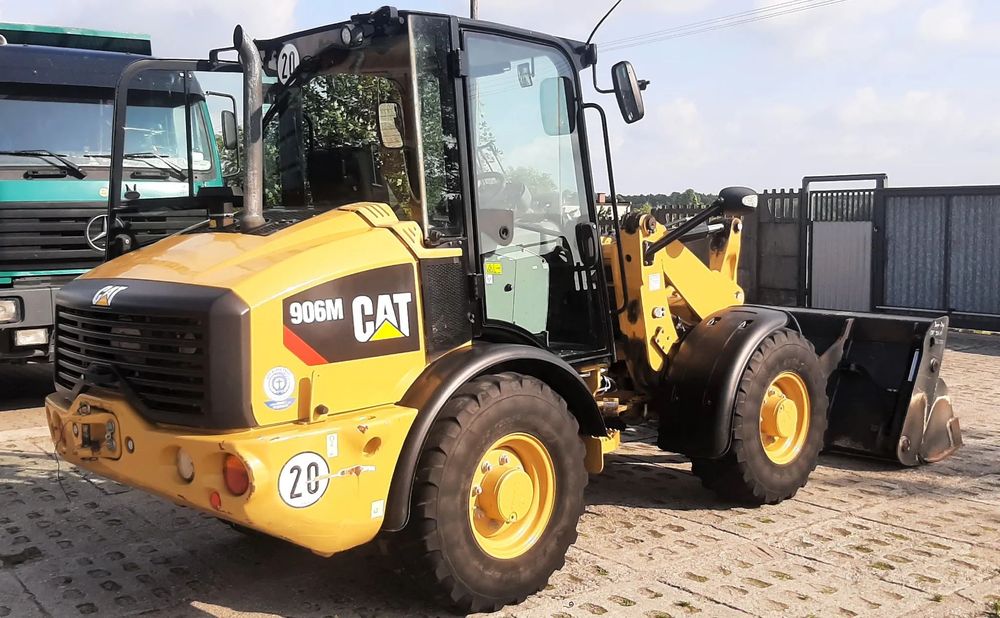 Caterpillar 906 M 906M  CAT Caterpillar 906 M 133999 netto Serwis Niemcy Tylko 2450h