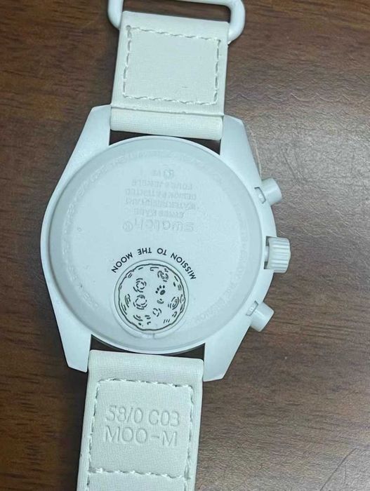 Swatch x Omega BioceramicMoonswatch MissionToMoonphase Snoopy
SO33W700