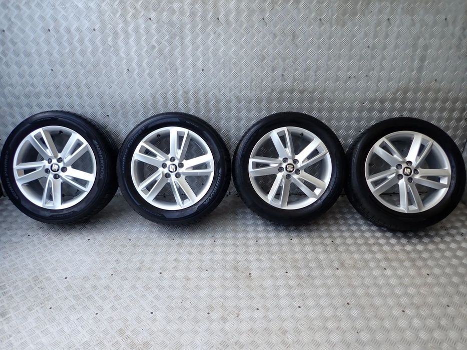 KOŁA FELGI ALUMINIOWE SEAT ARONA  6,5JX17  ET 48  5X100  6F9601025E Z OPONAMI LATO HANKOOK  205/55/17