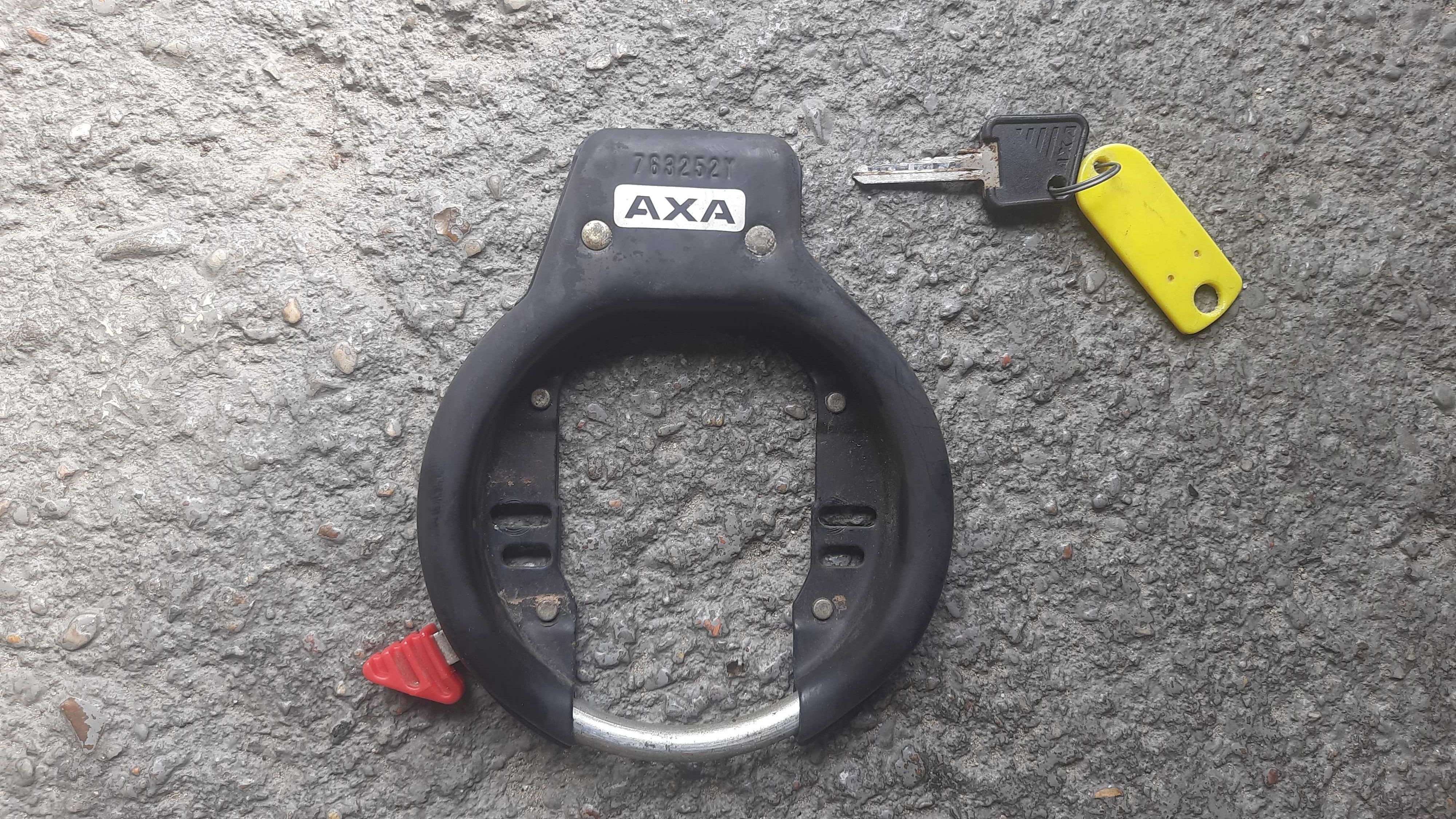 Blokada AXA na tylne koło