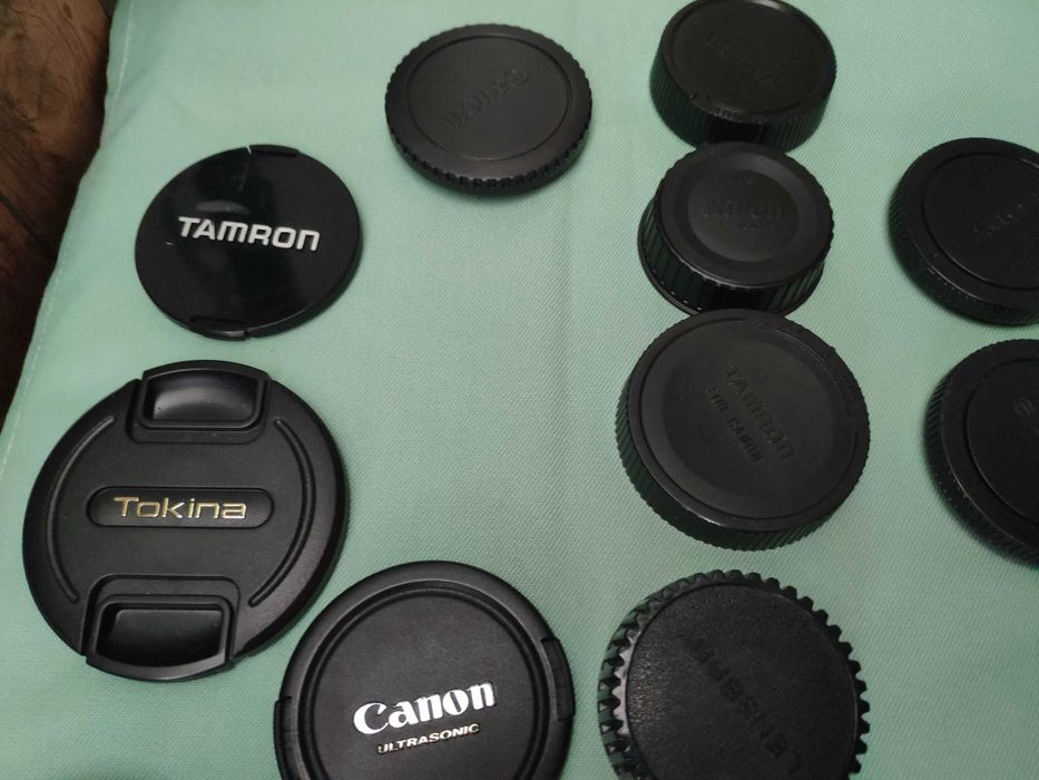 Tamps de máquinas e objetivas fotográficas Canon Nikon, Sigma Tamron,