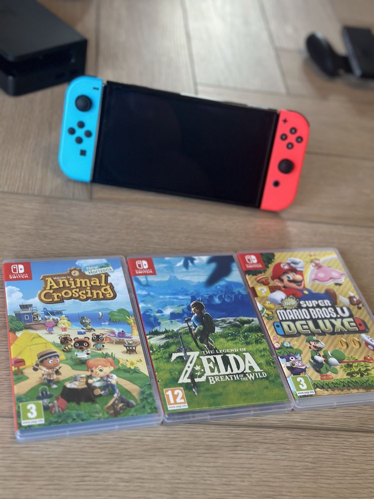 Nintendo switch OLED + gry i etui