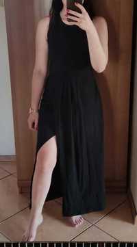 Długa czarna sukienka z rozcięciem Pakuten
