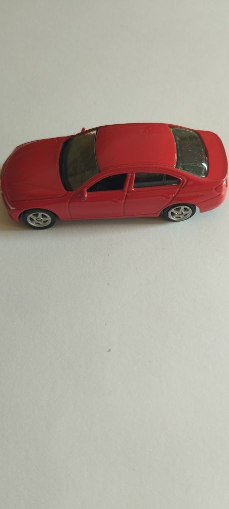 Samochód BMW czerwony, firma Welly
Figurka, model pojazdu