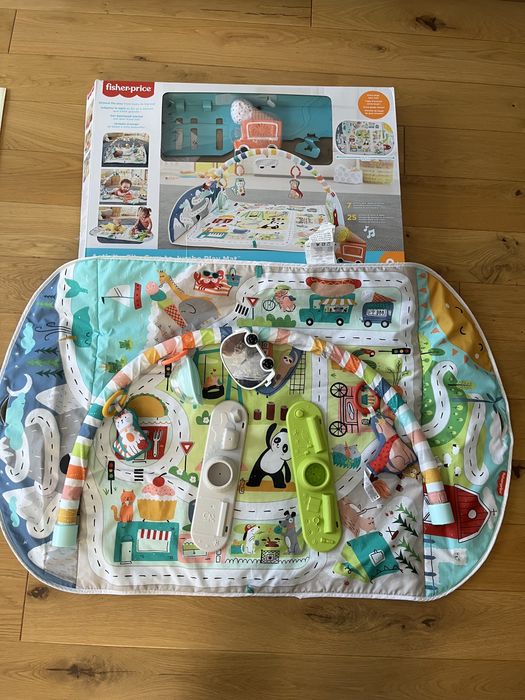 Mata edukacyjna wesołe miasteczko fisher Price