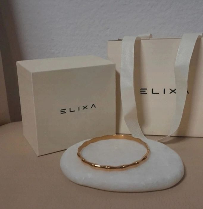 Bransoletka pozłacana Elixa. Sztywna