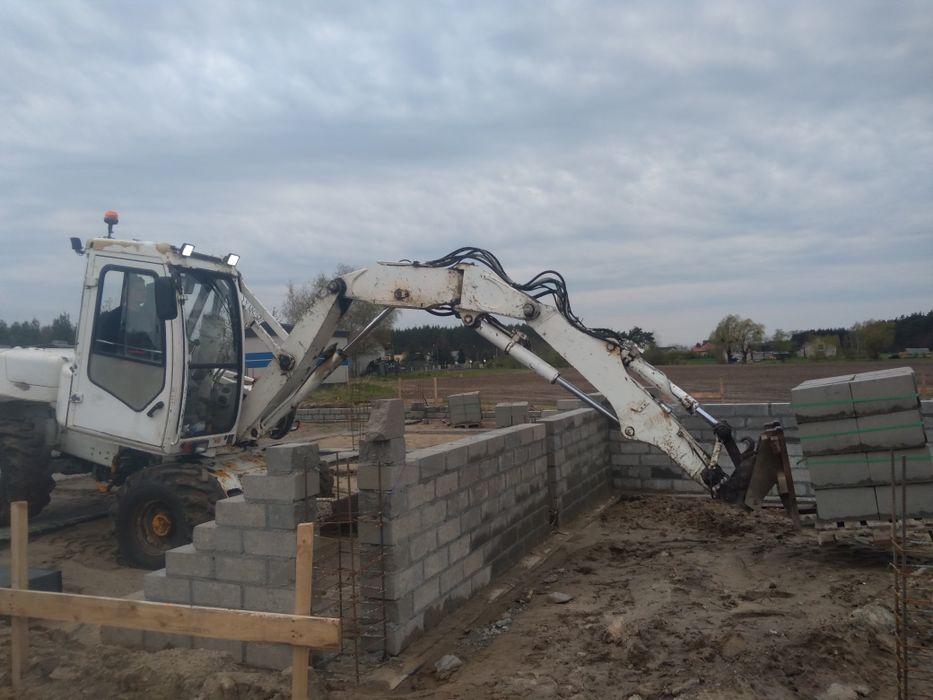 Usługi koparko ładowarką/koparka Mecalac