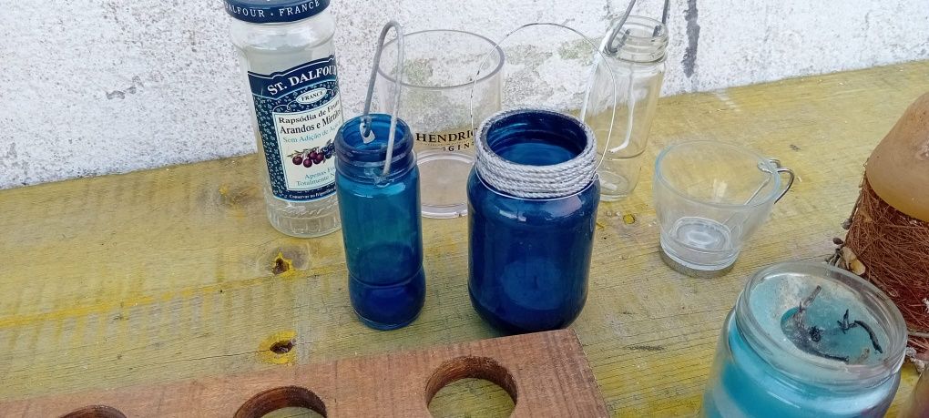 Conjunto de velas, porta-velas e frasquinhos