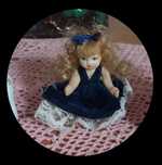 Mini laleczka z porcelany