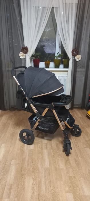 Прогулянкова коляска візочок Ninos Maxi ( Нінос ) з перекидною ручкою