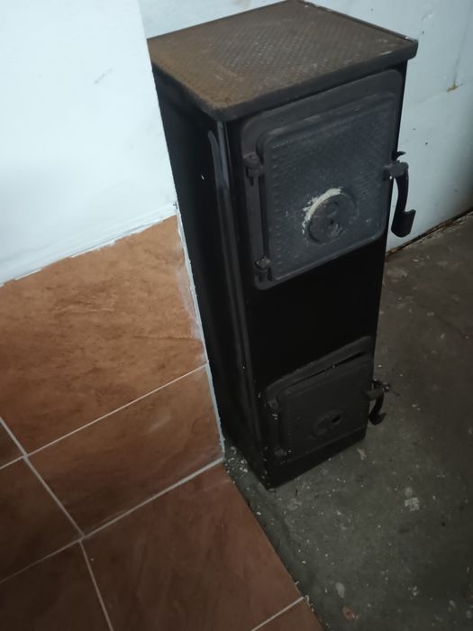 Piecyk  żeliwny, kominek koza