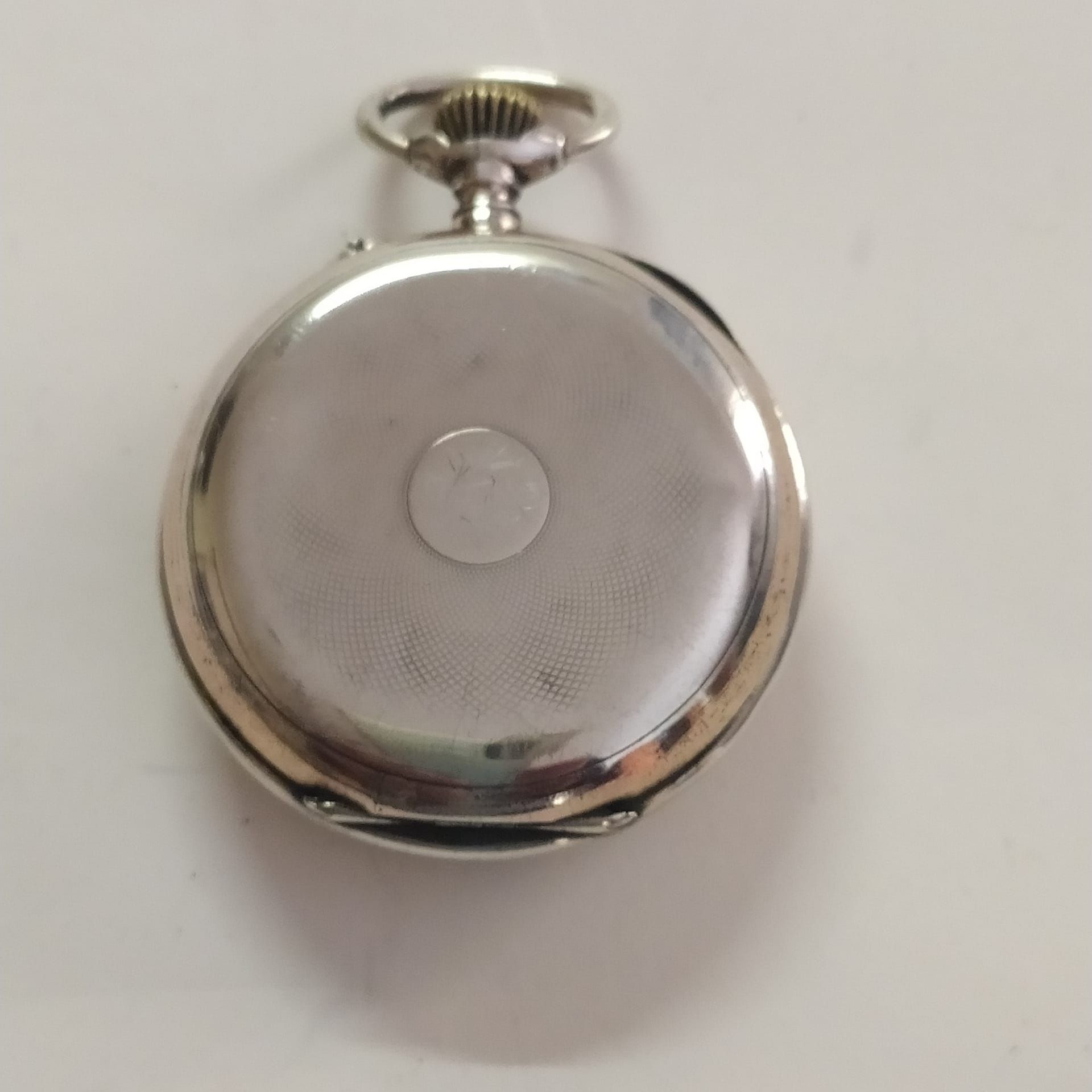 Antigo relógio de bolso em prata