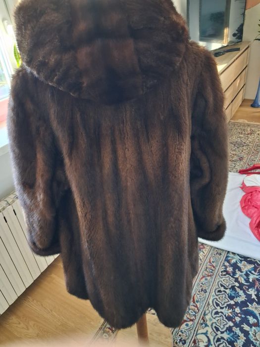 Norki.. futerko koloru brązowego z kapturem