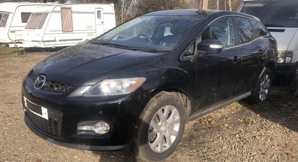 Мазда СХ 7 Mazda cx7 крила капот фари двері бампер розборка