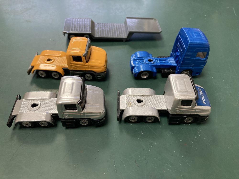 Lote 4 miniaturas Siku camiões