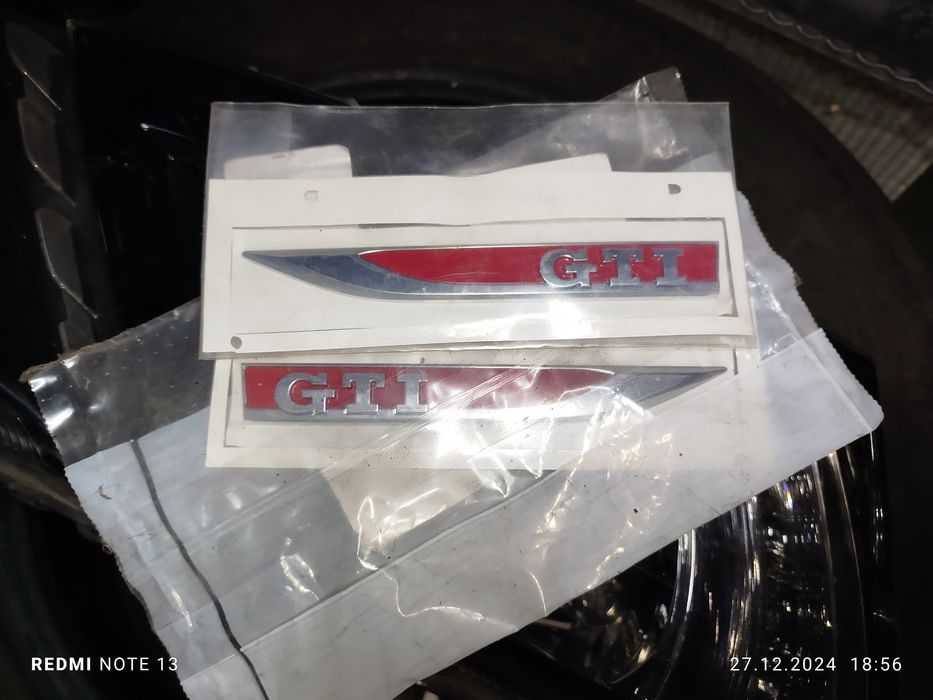 Emblemat znaczek napis GTI VW golf vii 7 nowy oryginalny  prawy lewy