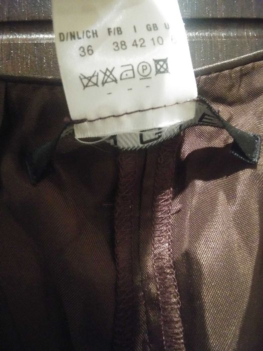 Костюм шоколадного кольору. Розмір  L,