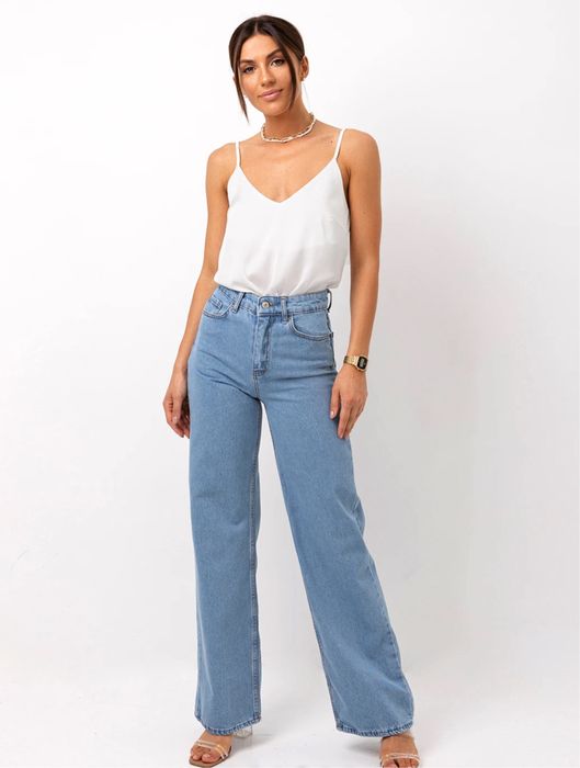 Джинси труби блакитні