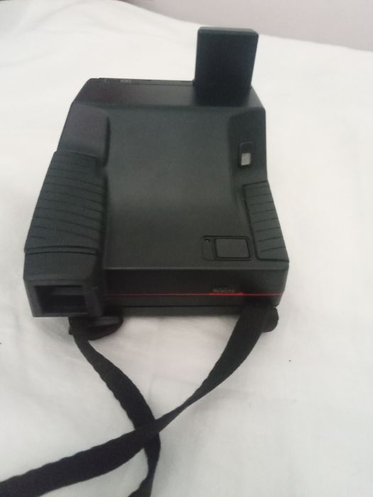 Máquina fotográfica poloroid impulso