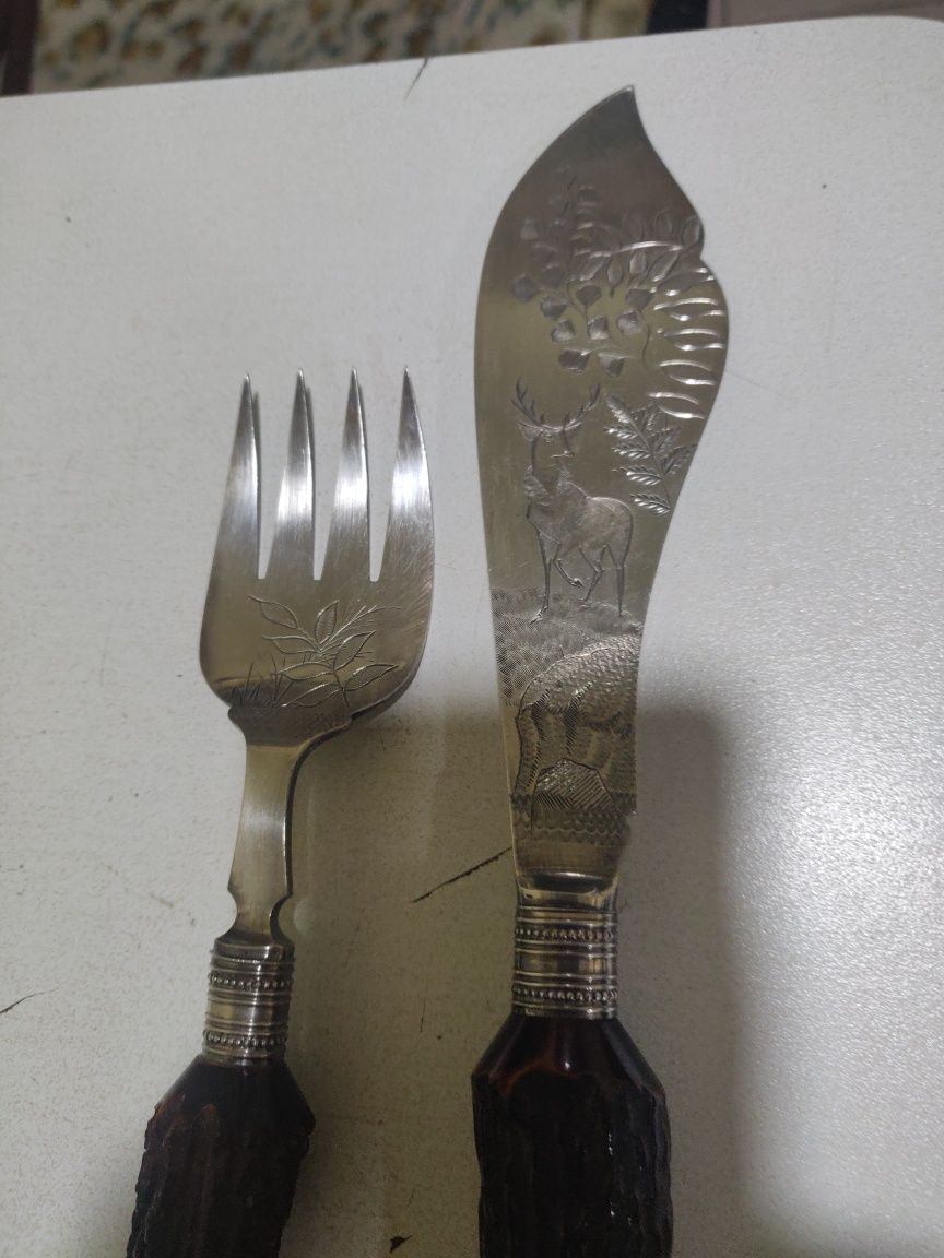 Talheres antigos com cabo de chifres
