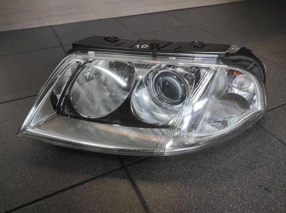 LAMPA PRZEDNIA PRZÓD LEWA VW PASSAT B5 FL LIFT HELLA CAŁA EUROPA WYSYŁKA !!!!