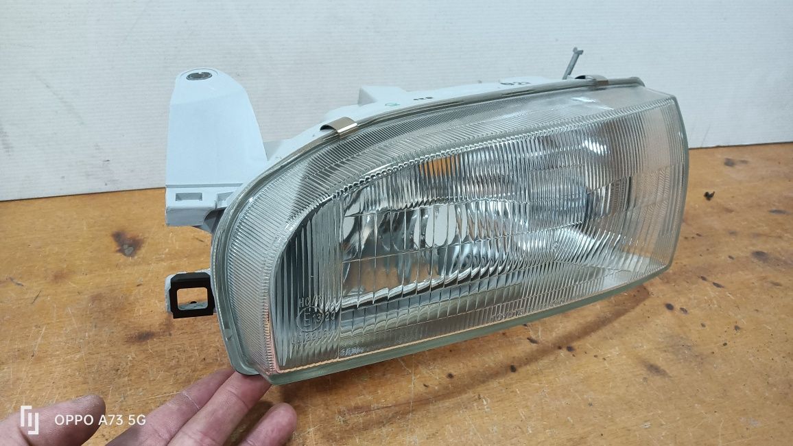 Farol Toyota Corolla ótica 1989 esquerdo