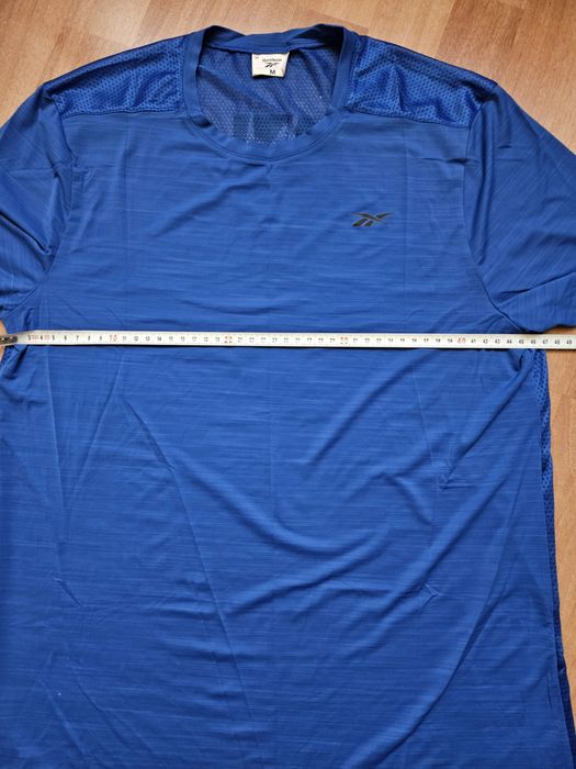Продам футболку для бега , занятием спортом Reebok.