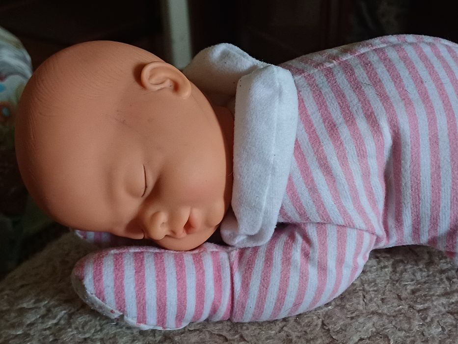 Сплячий музичний пупс