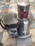 Соковыжималка Kenwood.