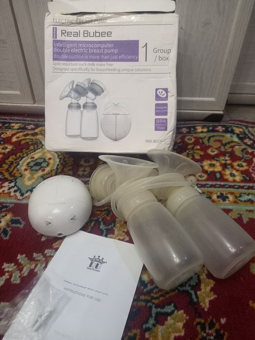 Молокоотсос / молоковідсмоктувач  электрический и русной