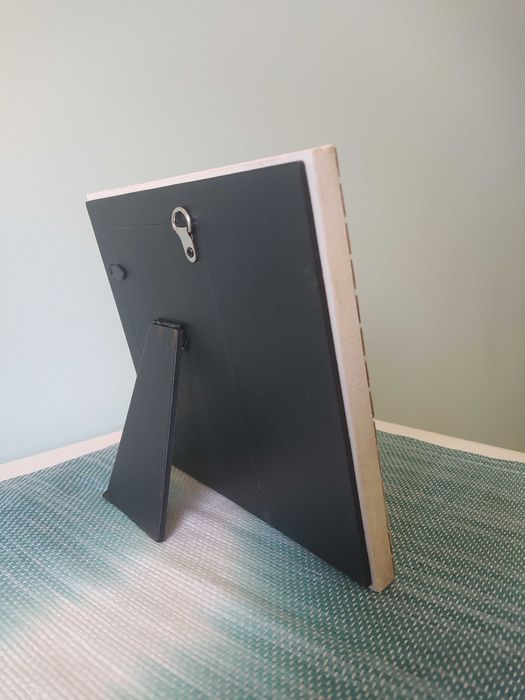 Moldura em pedra-Maria com menino Jesus