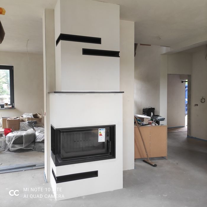 Kominek z szybą boczną narożny kominki