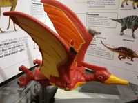 Dinossauro voador articulado mexe as asas