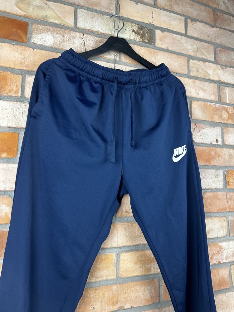 Синие штаны Nike