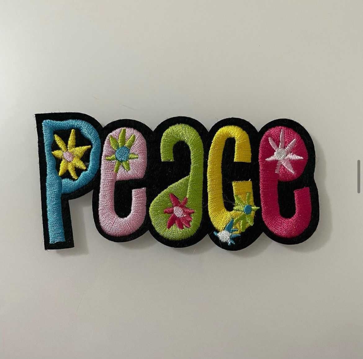 Emblema Peace Novo