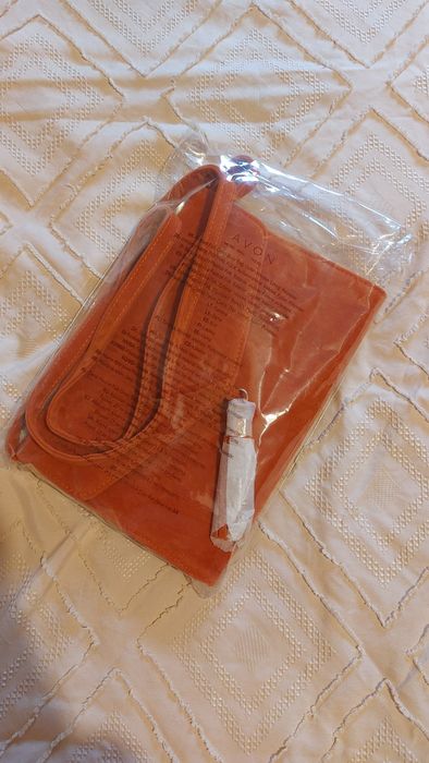 Mala tiracolo da Avon