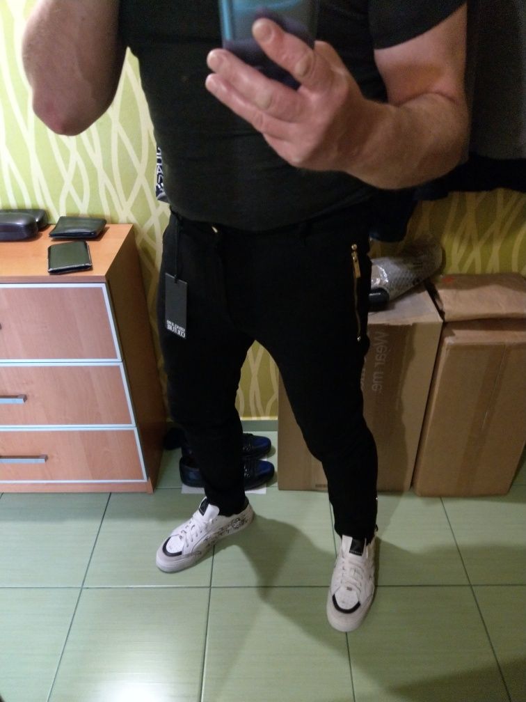 Wyprzedaż spodnie męskie Versace Jeans Couture.