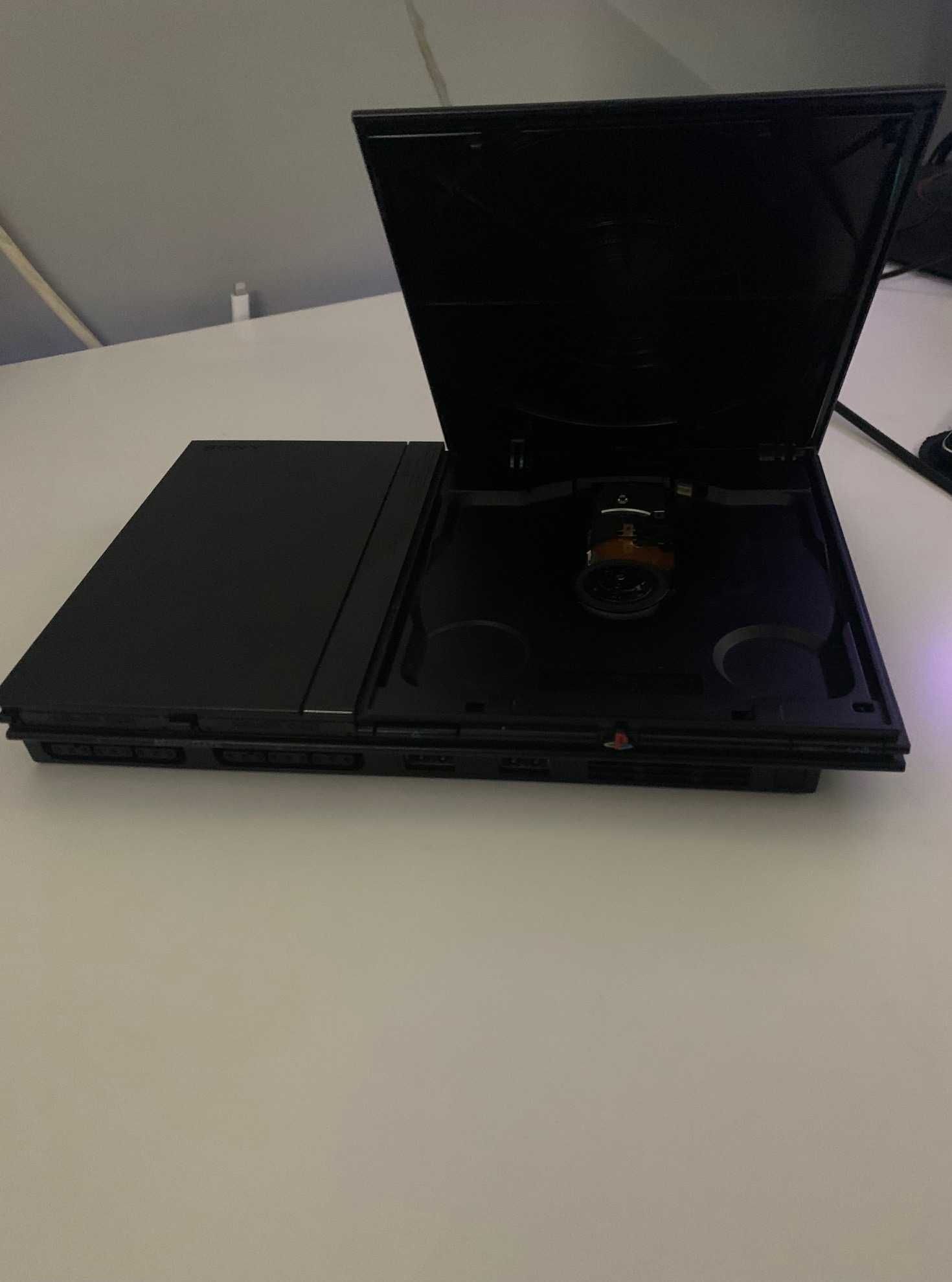 PS2 Slim com 2 comandos e 9 jogos