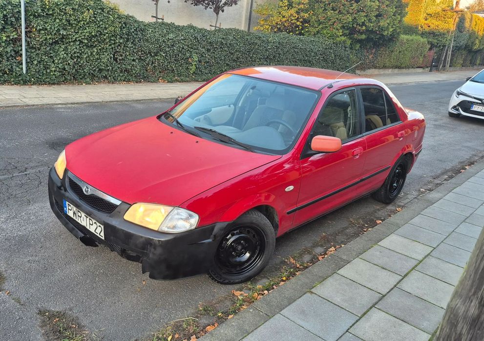 Mazda 323 sedan mały przebieg OC 10/2026