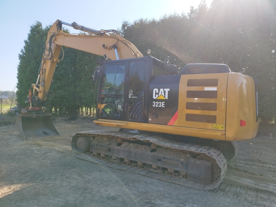 Koparka CAT 323E, gasienica CAT 950M