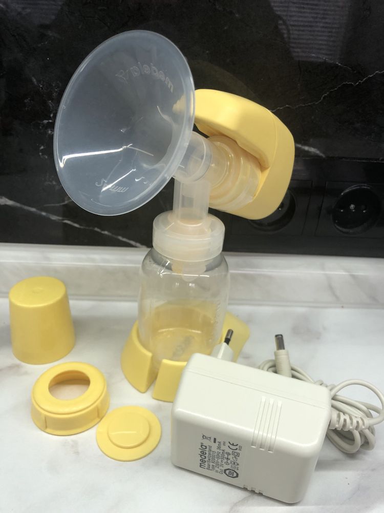 Новый Молокоотсос Medela Mini Electric