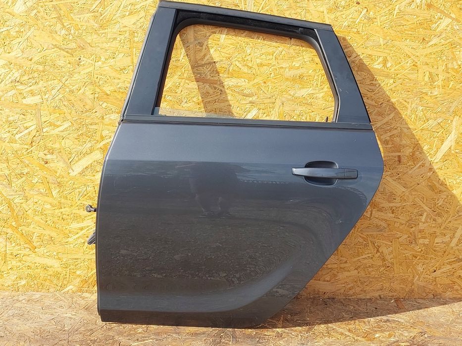 Drzwi lewe tylne Opel Astra J kombi  Z177