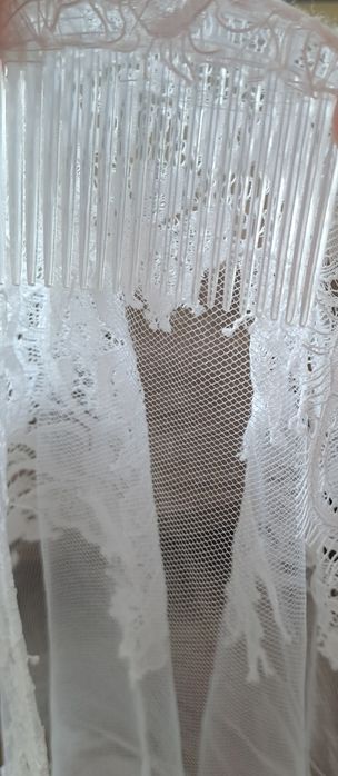 Piękna biała suknia ślubna długi koronkowyrękaw