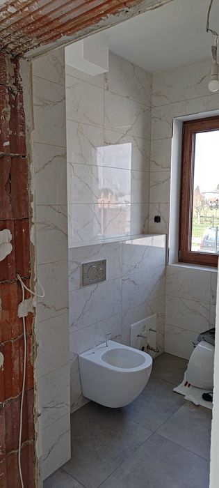 Remonty wykończenia wnętrz kafelkowanie malowanie tapetowanie panele