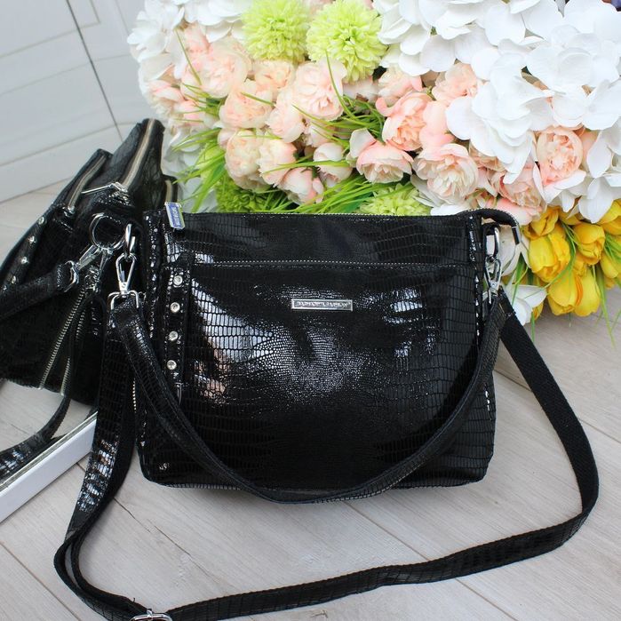 Неймовірна жіноча сумка із лазерної натуральної шкіри