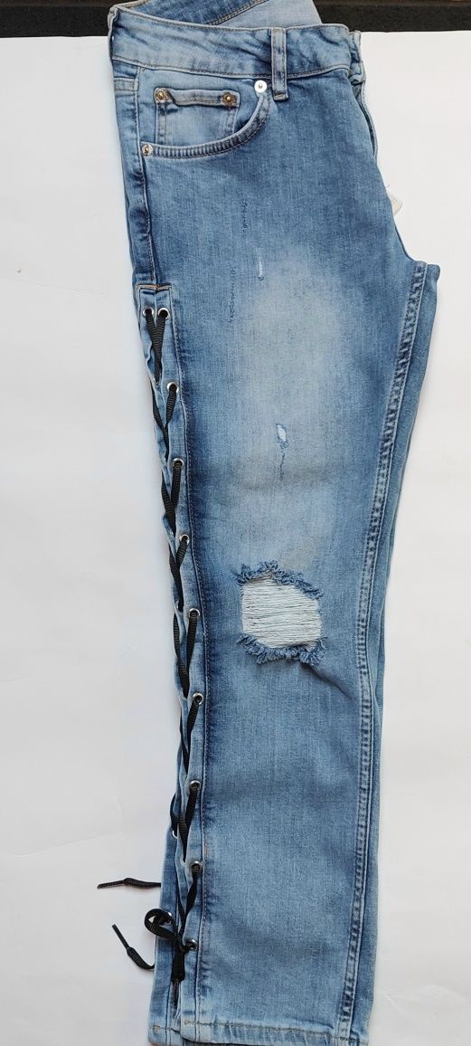 Spodnie sznurowane jeans z przetarciami  L
