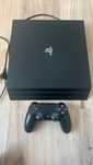 Play Station 4 Pro + Pad + 3 gry