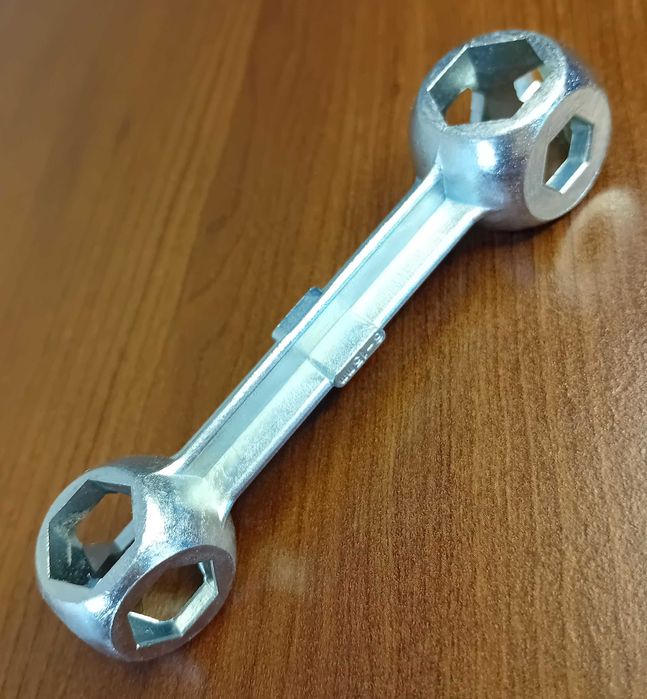 Niemiecki klucz rowerowy uniwersalny 10w1 w kształcie kości  /nowy/.