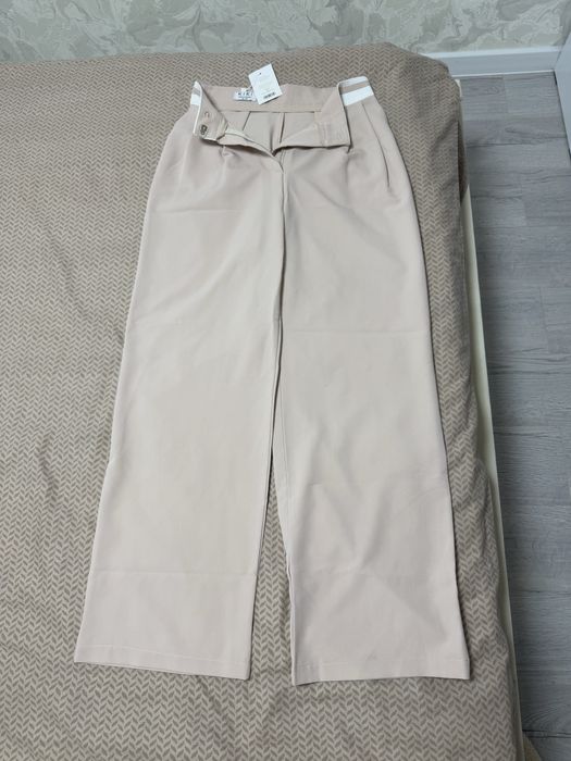 Штани нові С-М бежеві