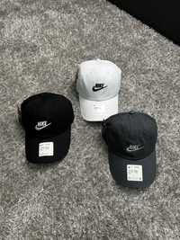 Нові кепки Nike